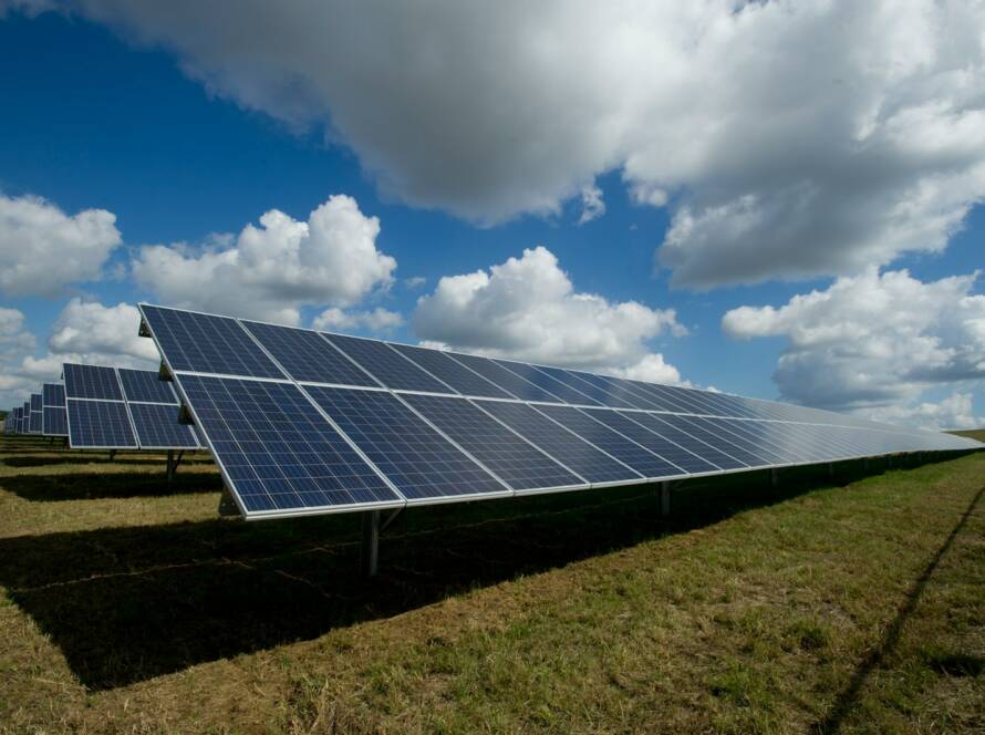 solar panels on green field